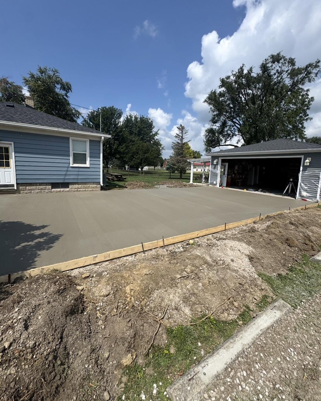 Finished concrete driveway and garage pad