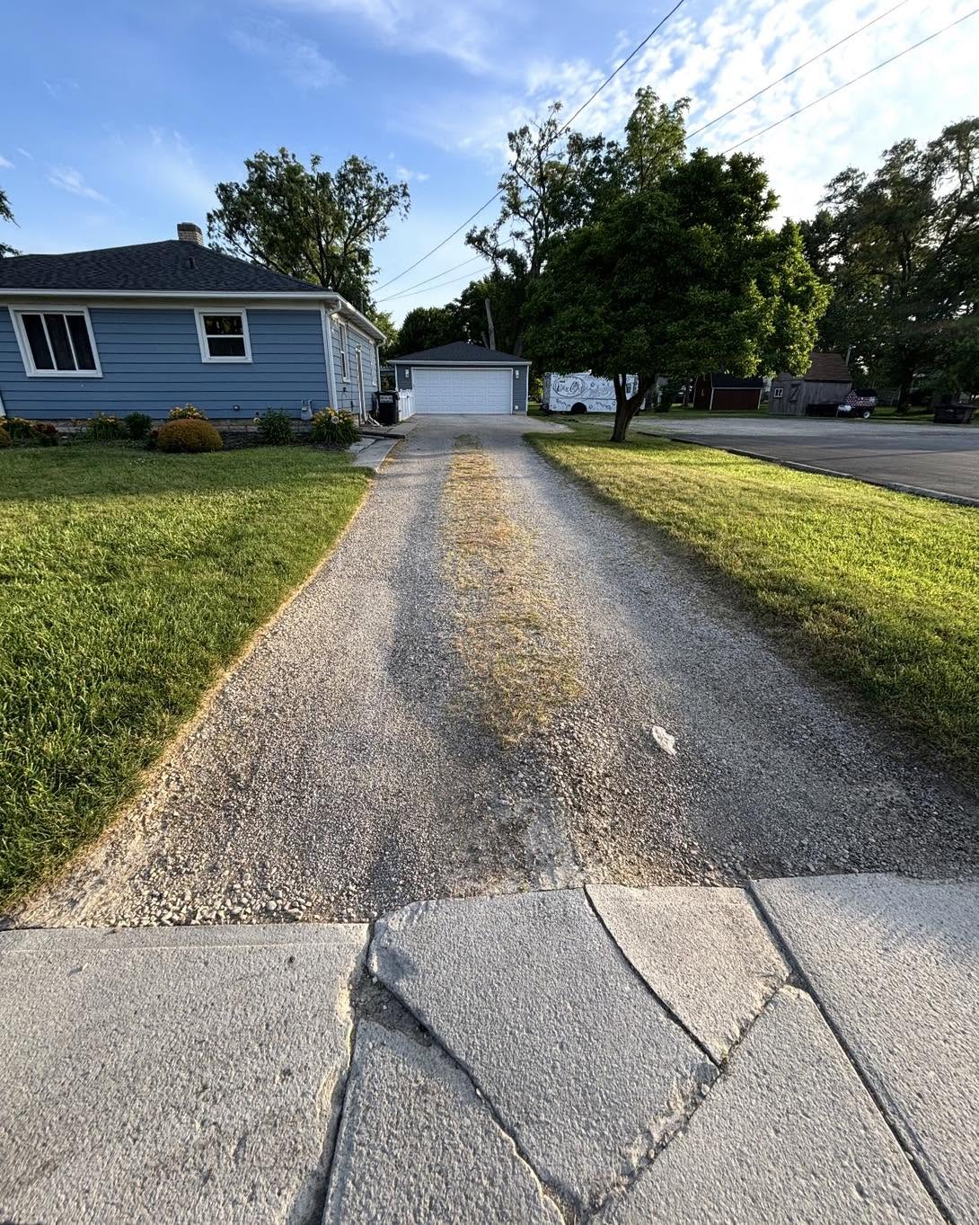 Gravel driveway before concrete replacement
